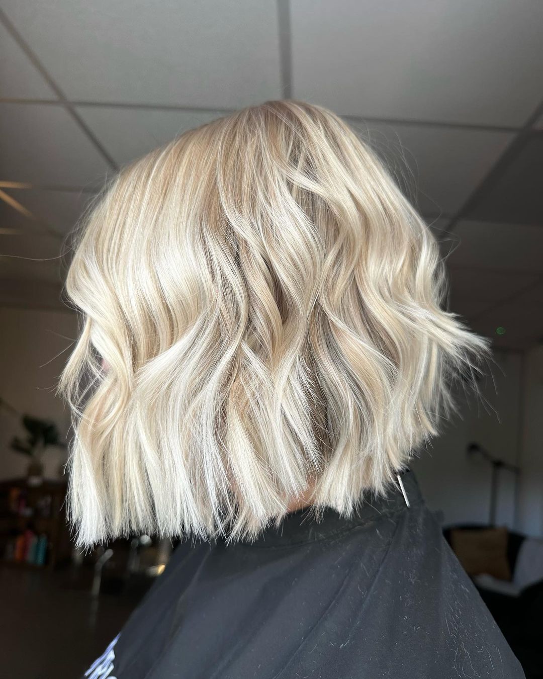 white blonde sharp bob cut