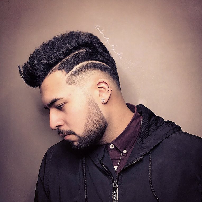 faux hawk fade with design