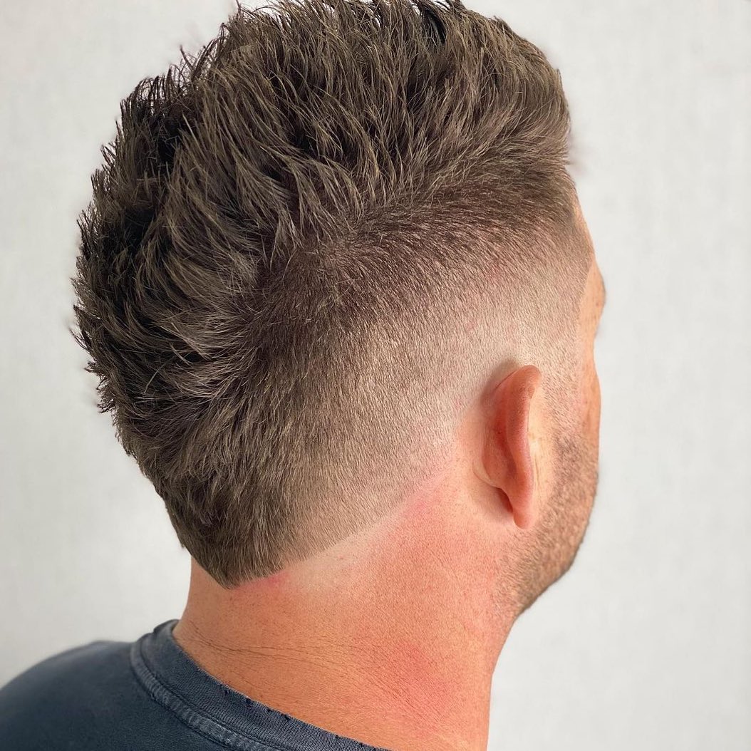 faux hawk fade with v-neckline