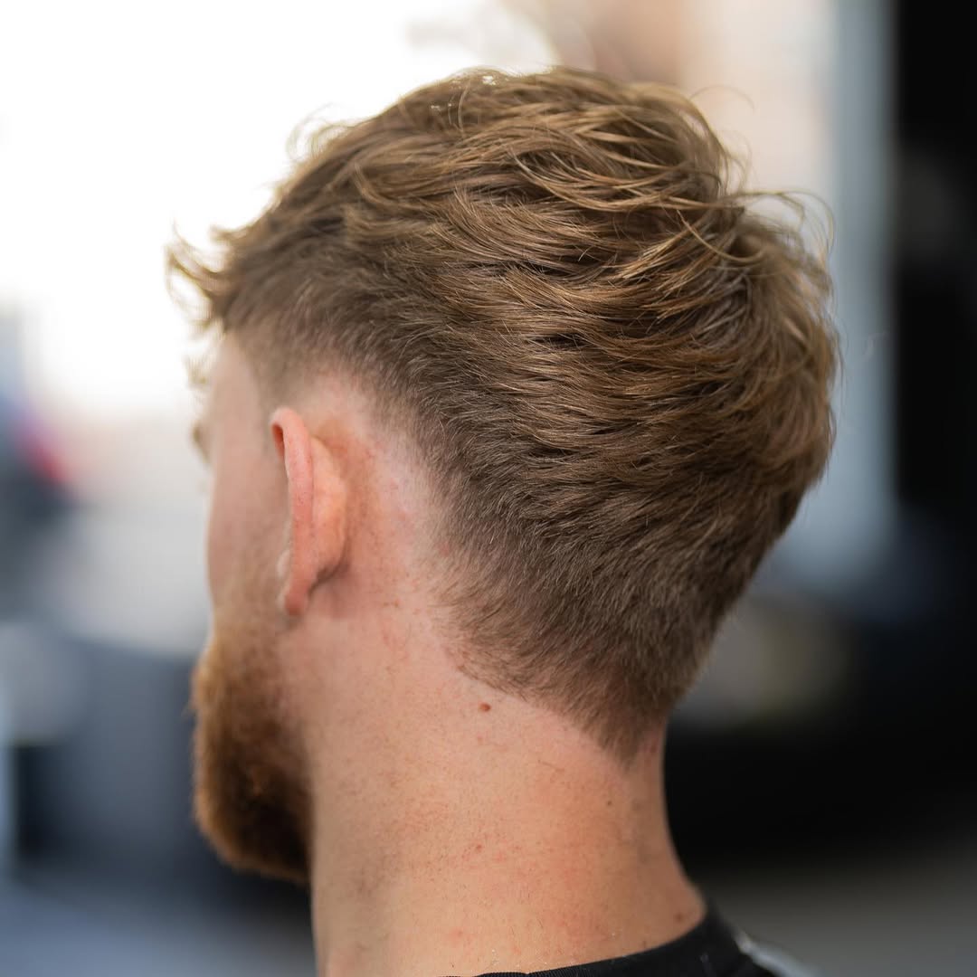 faux hawk mid-fade