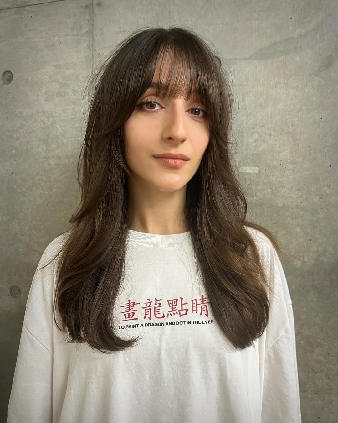 Layered Haircut With Wispy Bangs