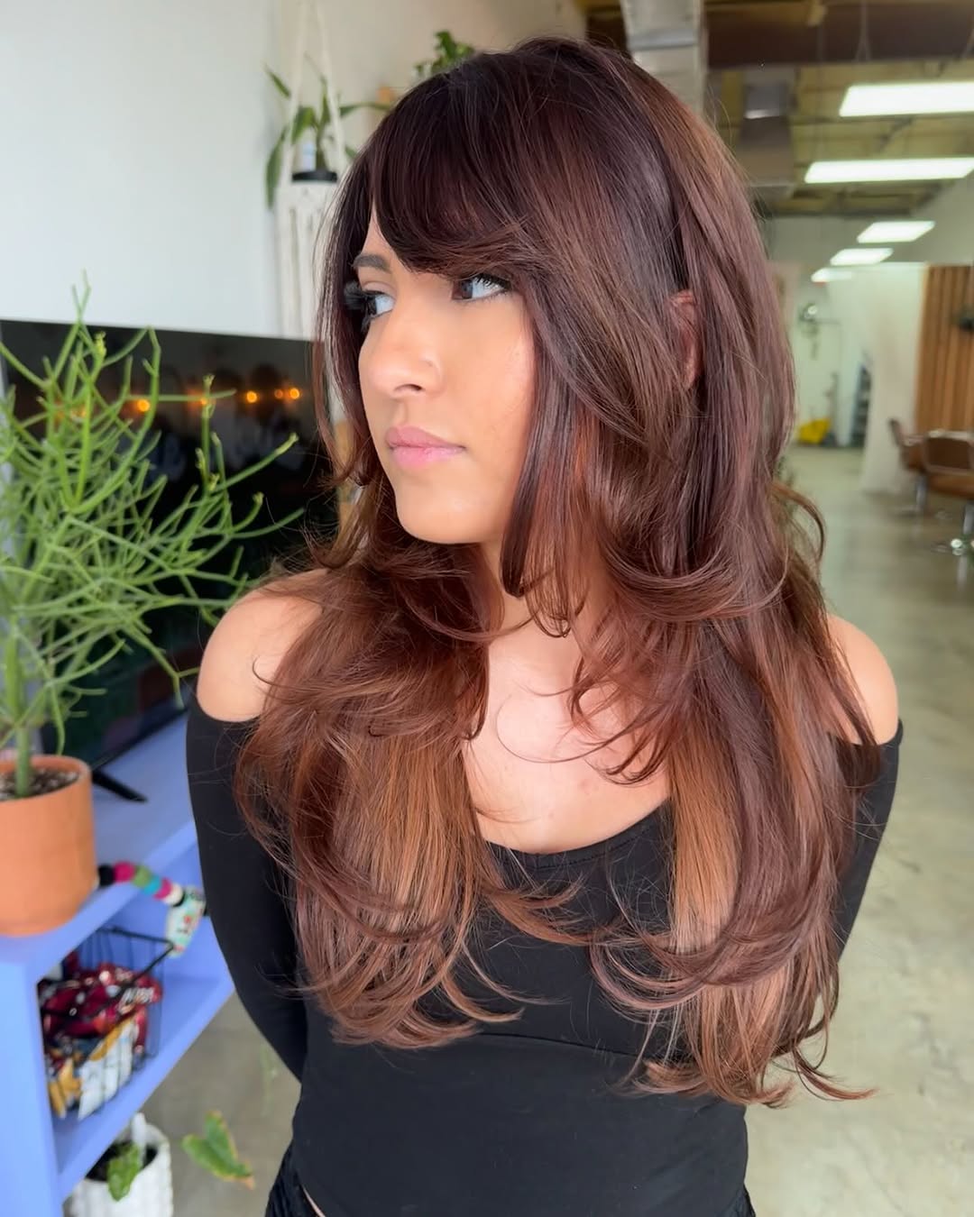 Long Layered Haircut With Side Bangs