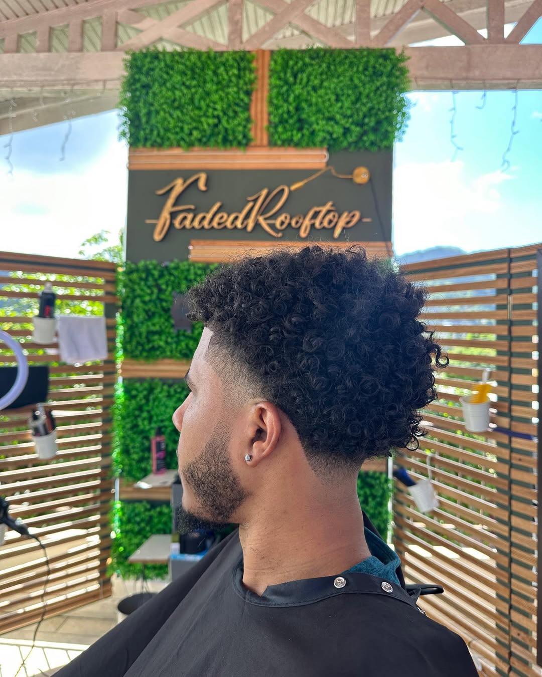 low taper fade with curly top