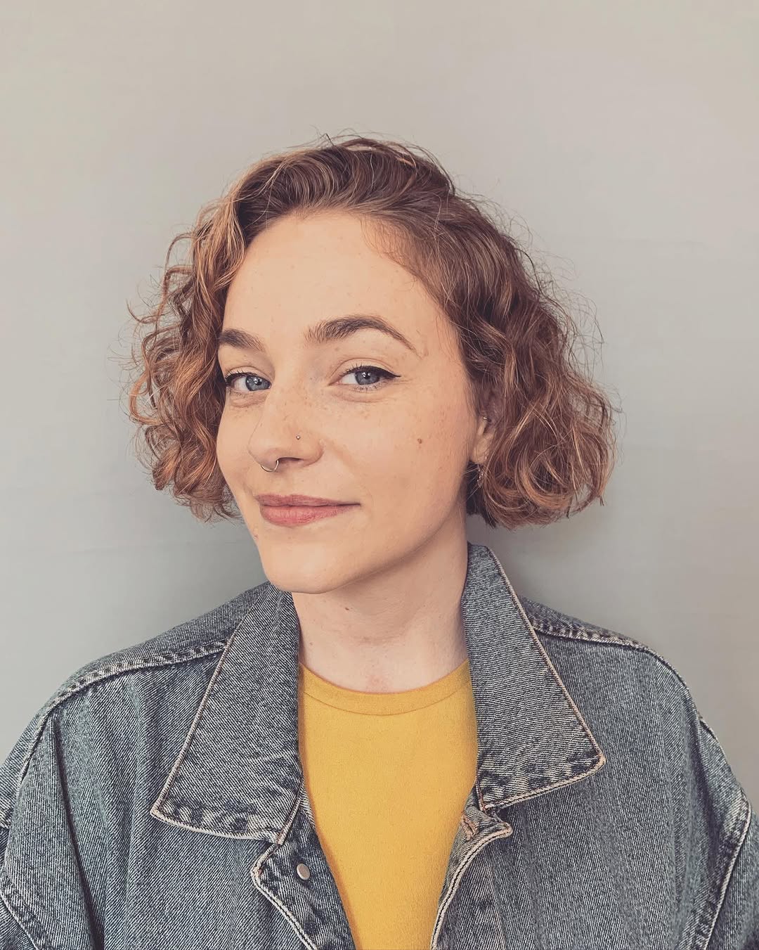 side-part curly bob