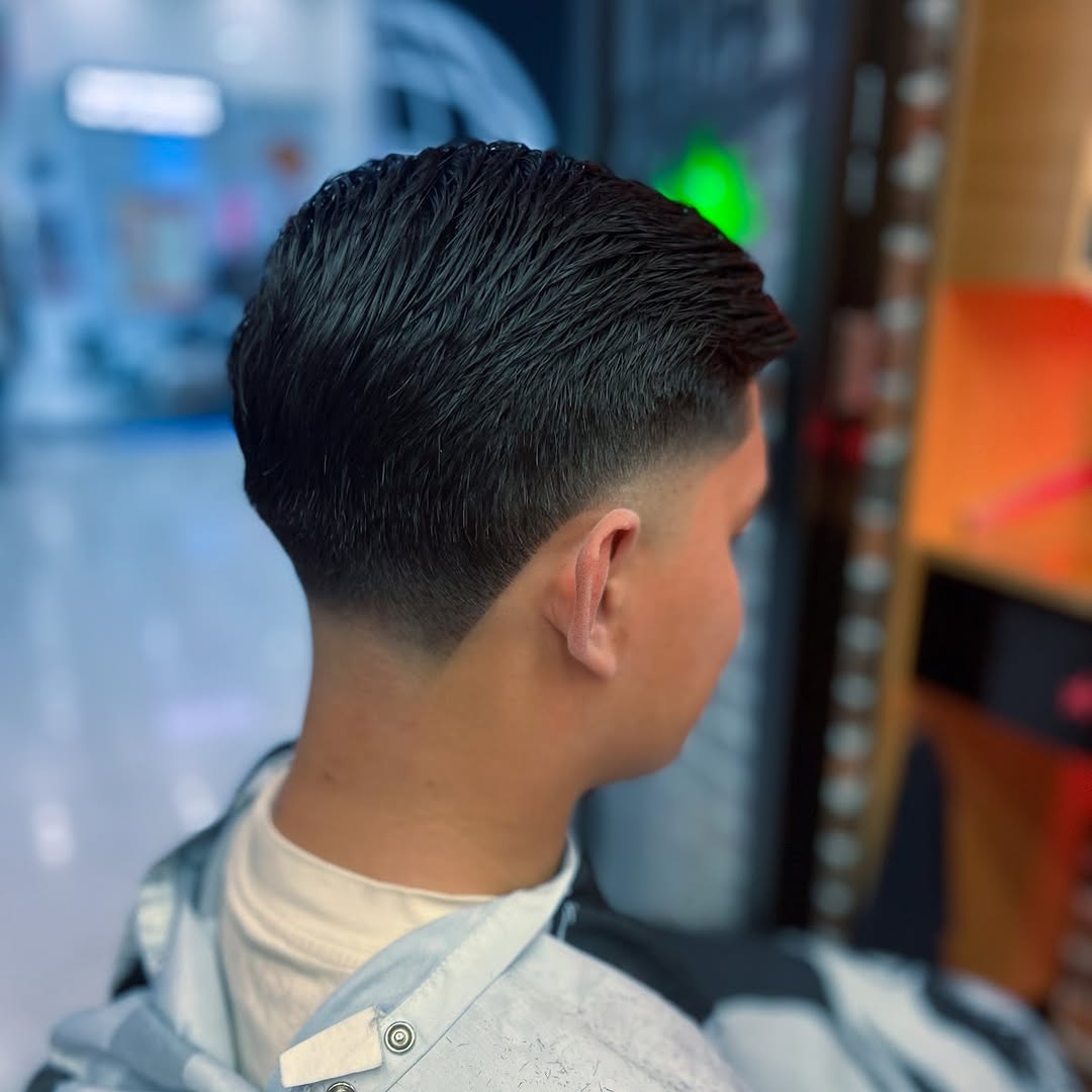 slicked-back low taper fade