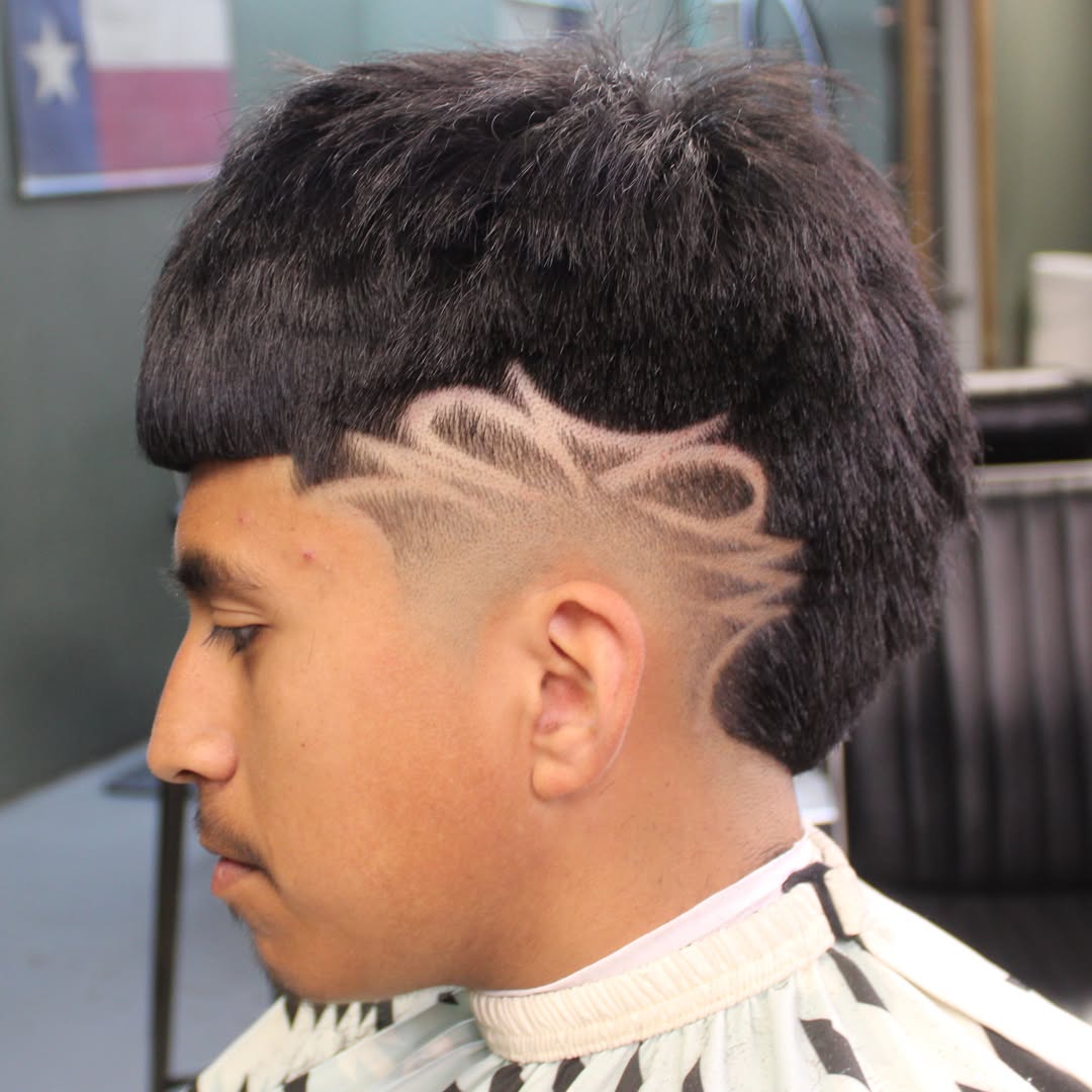 mid burst fade with a freestyle design