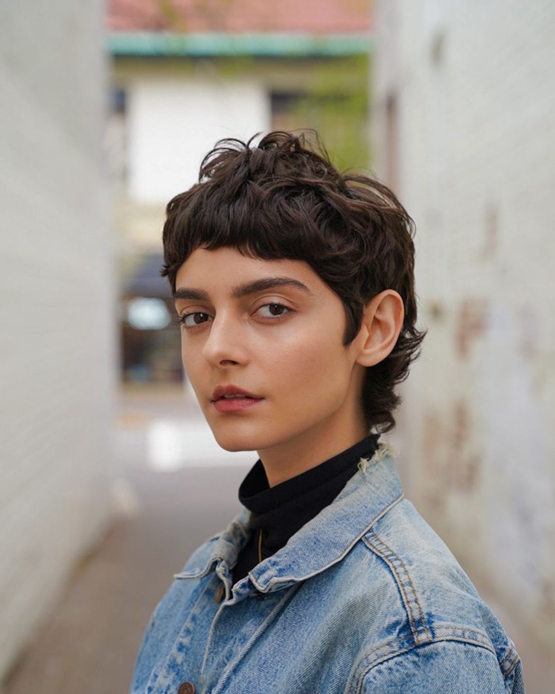 shaggy pixie mullet with micro bangs