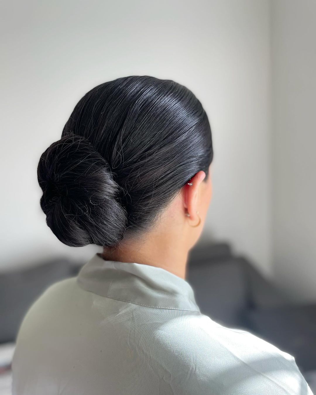 11 Trendy Slick Back Bun Styles For Every Occasion