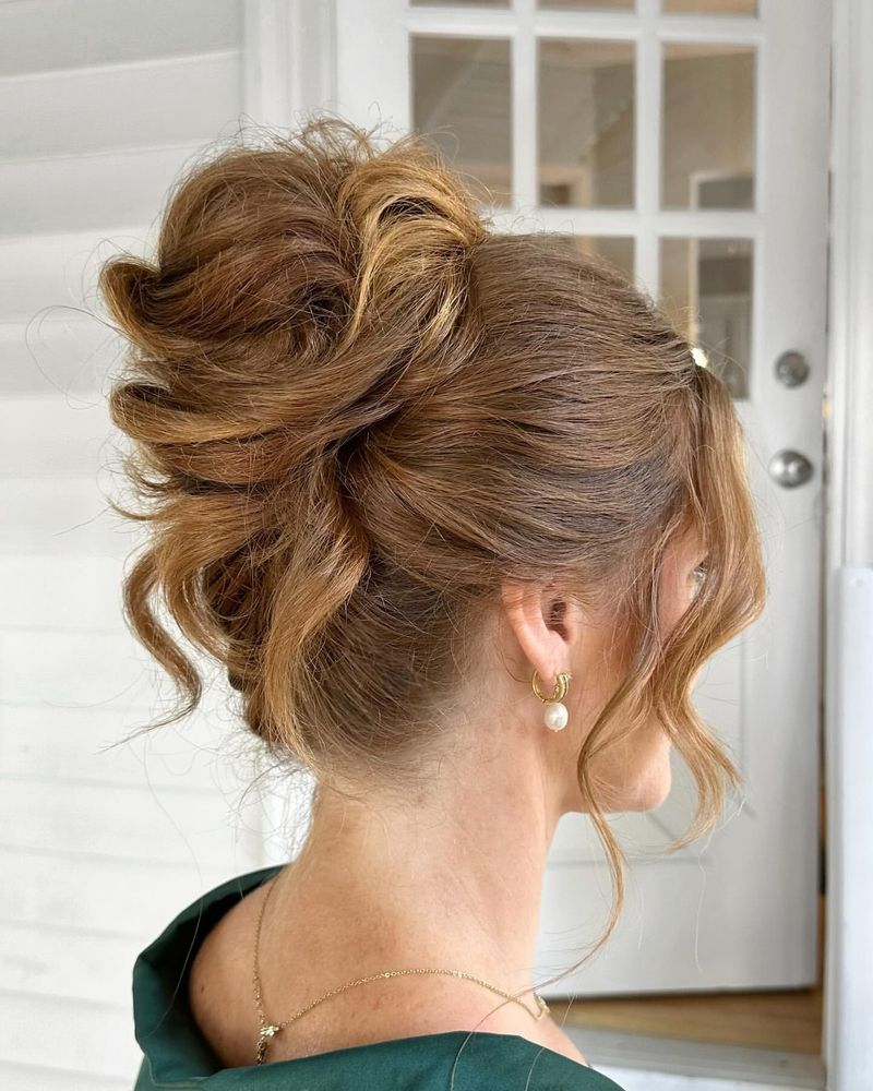 Curtain Bangs with a High Bun