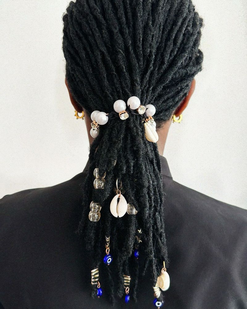 Locs with Shell Accessories