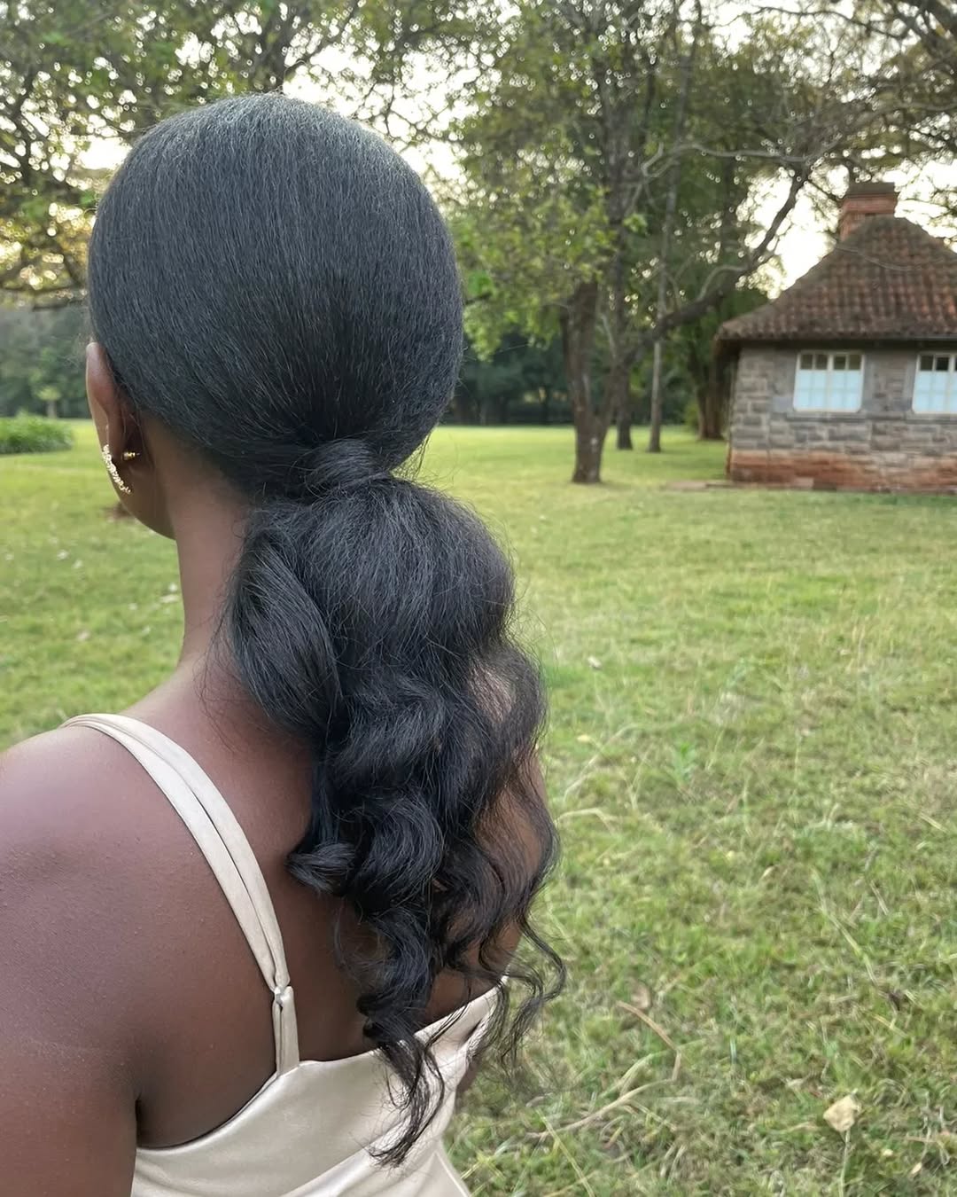 Low Curly Ponytail