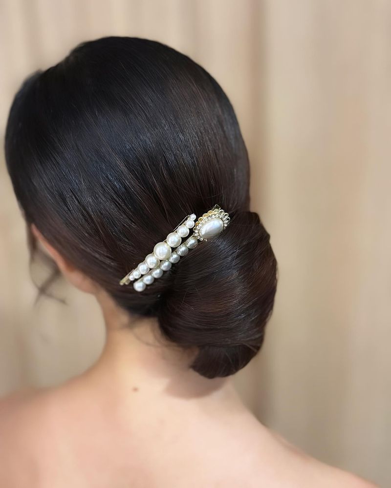 Chignon sottile con spilli