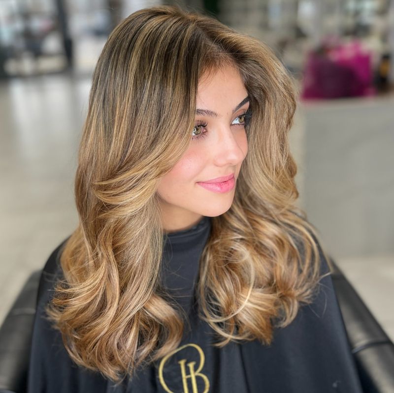 Rizos suaves con mechas