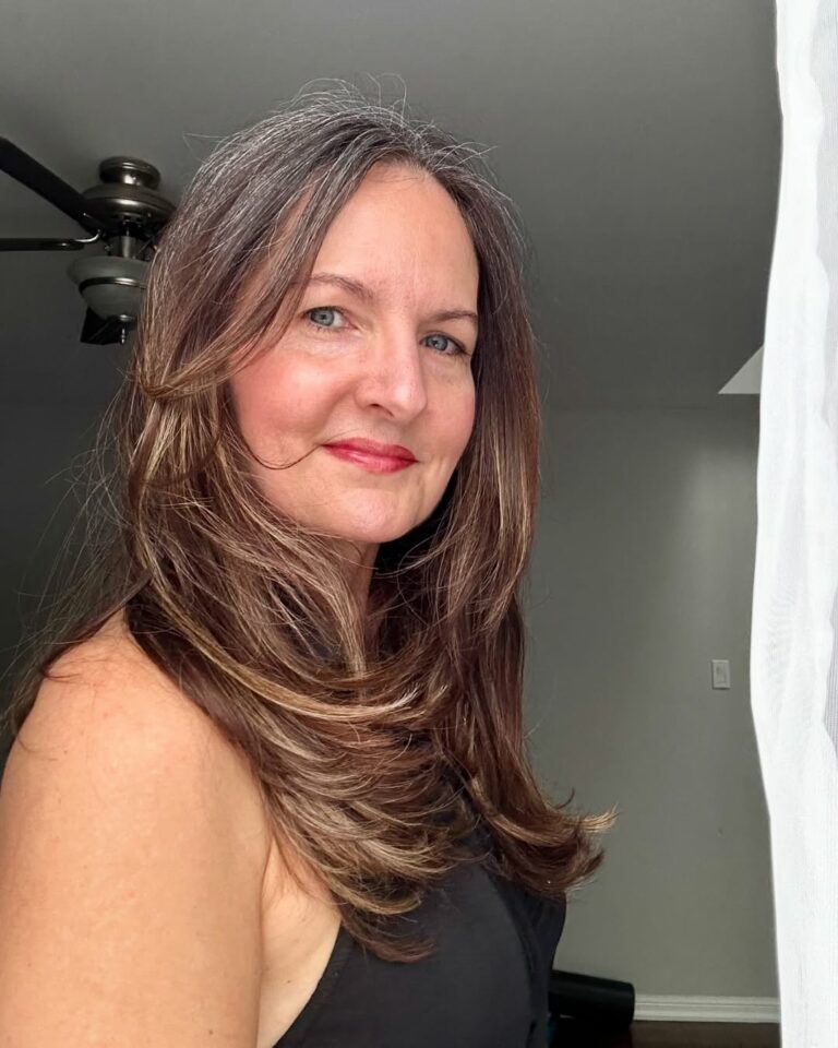 why-curtain-bangs-are-the-best-face-framing-cut-for-women-over-50