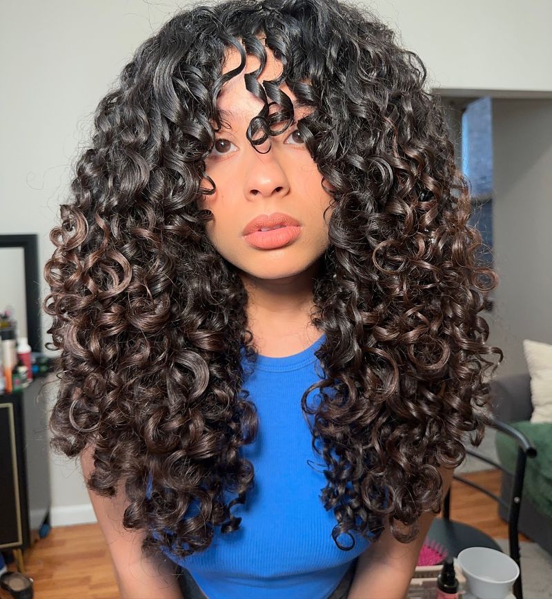 Sculpted Curls with Deep Part