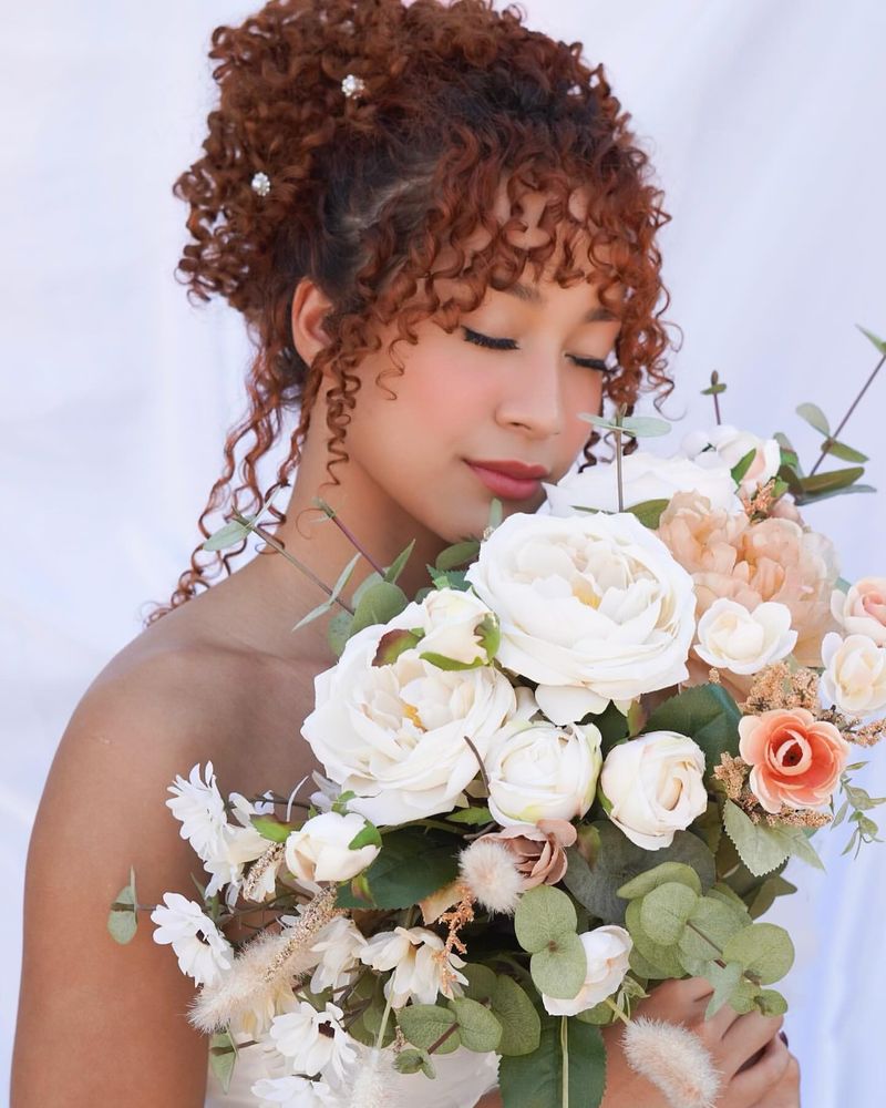 Voluminous Curly Updo