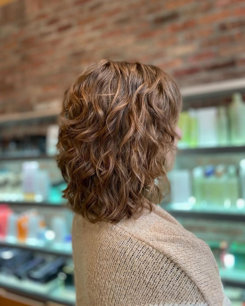 Curly Bob with Sun-Kissed Highlights