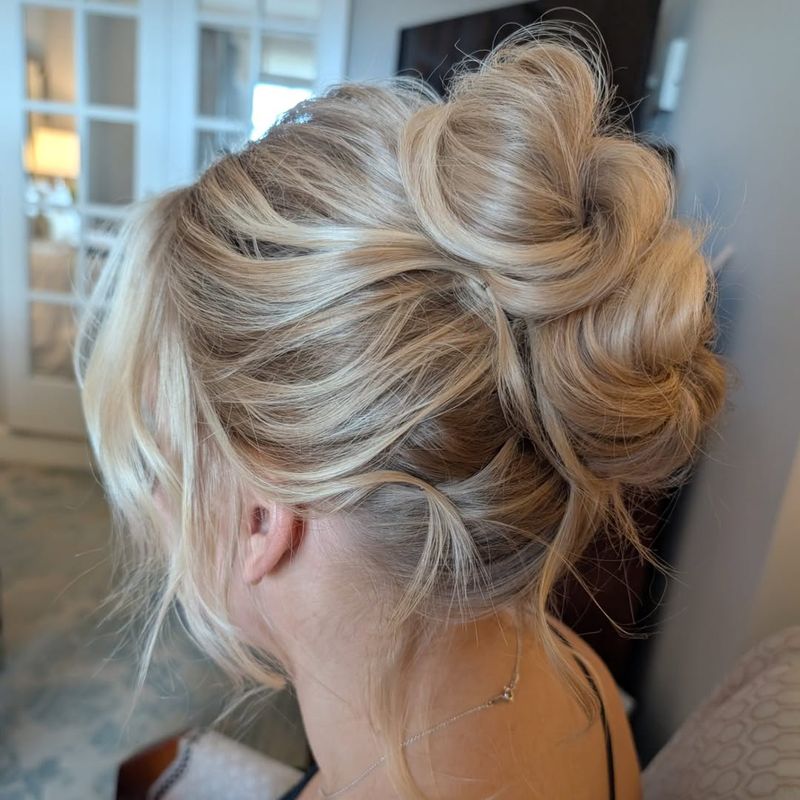 High Bun with Loose Strands