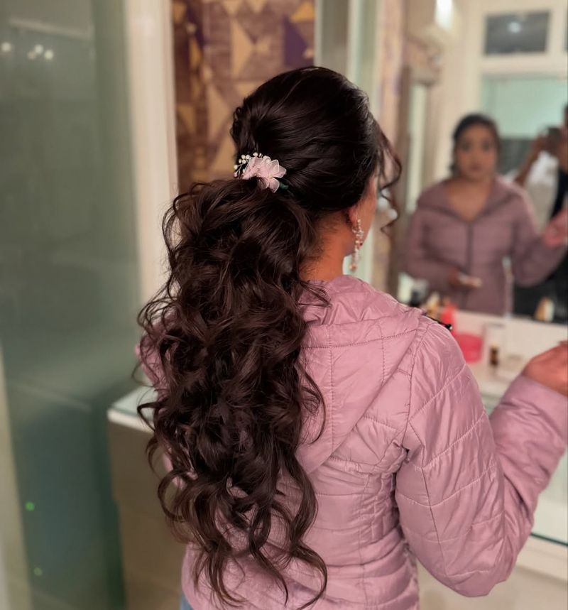 Cascading Curls Ponytail