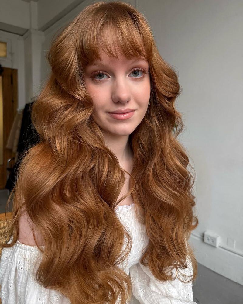 Voluminous Waves with Straight-Across Bangs