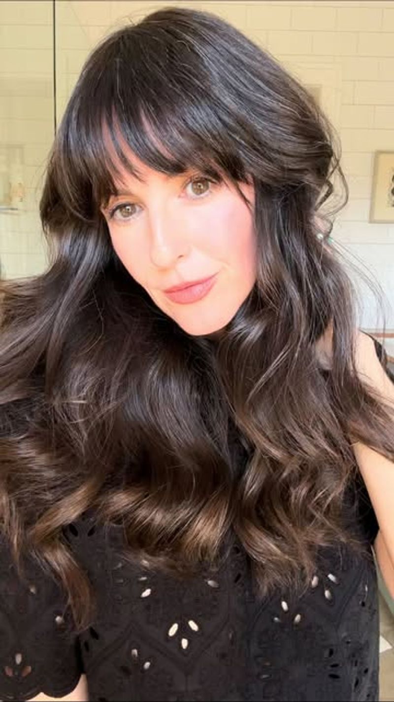 Glamorous Waves with Full Bangs