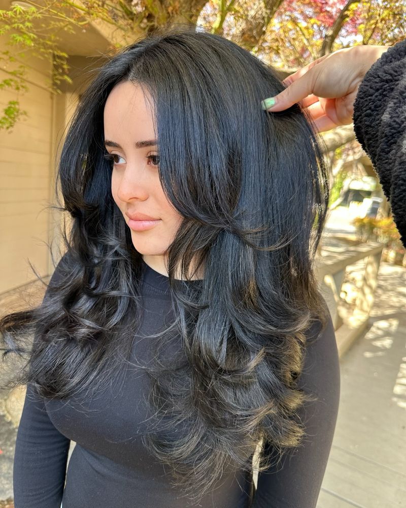 Butterfly Layers with Side-Swept Bangs