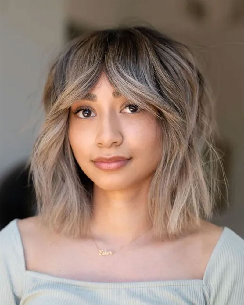 Blunt Mid-Length Cut with Curtain Bangs