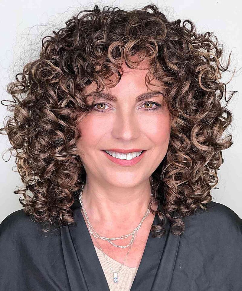 Rizos suaves con mechas