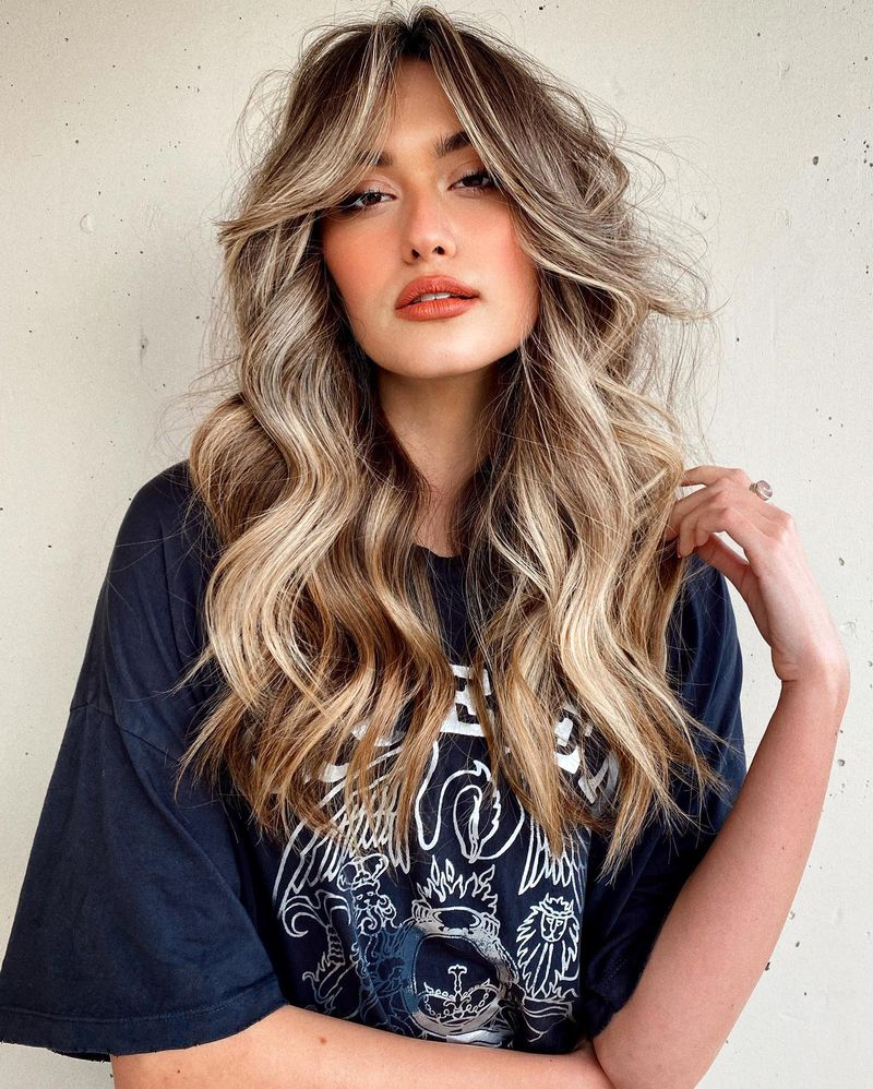 Glamorous 70s-Inspired Curtain Bangs