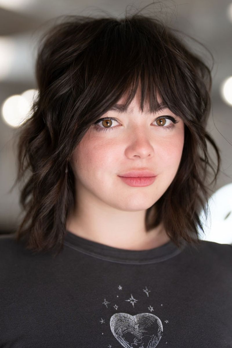 Shaggy Mid-Length Cut with Wispy Bangs