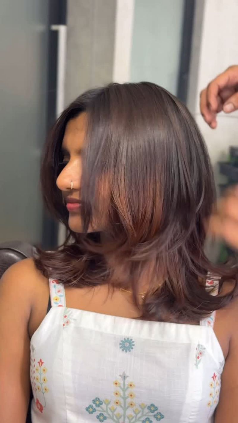 Shoulder-Length Cut with Swooping Layers