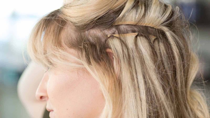 How long should I wait before washing new extensions?