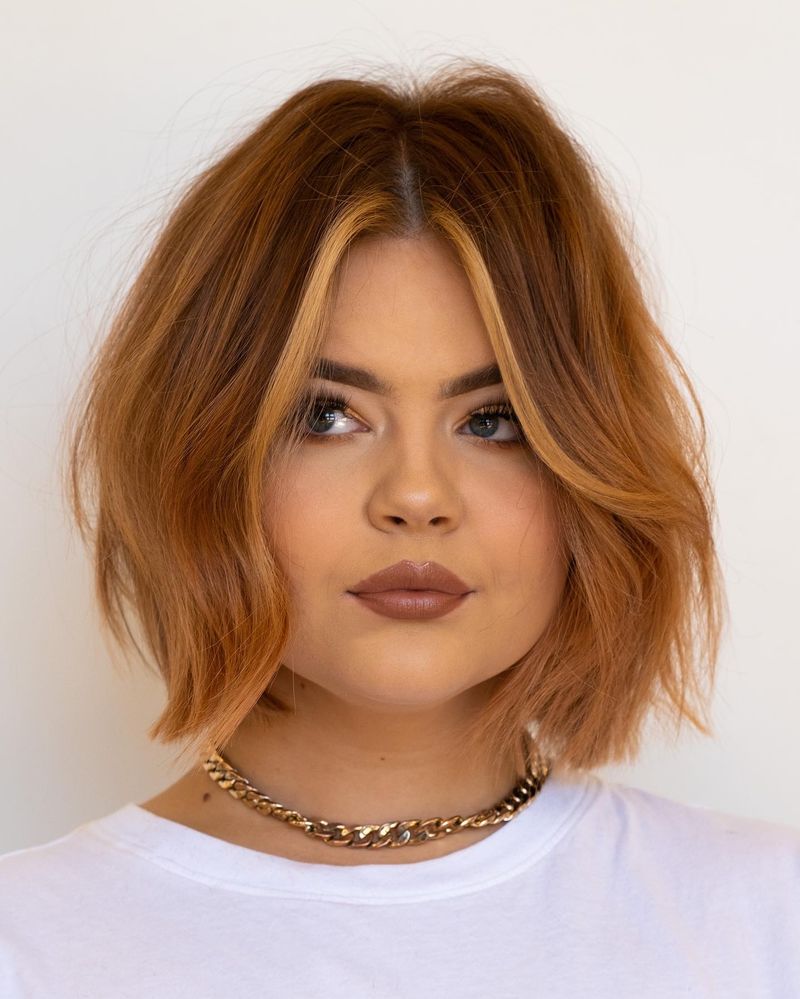 Inverted Bob with Feathered Layers for Round Faces