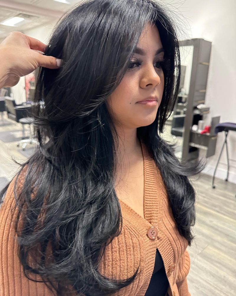 Layered Mid-Length Cut with Side Sweep