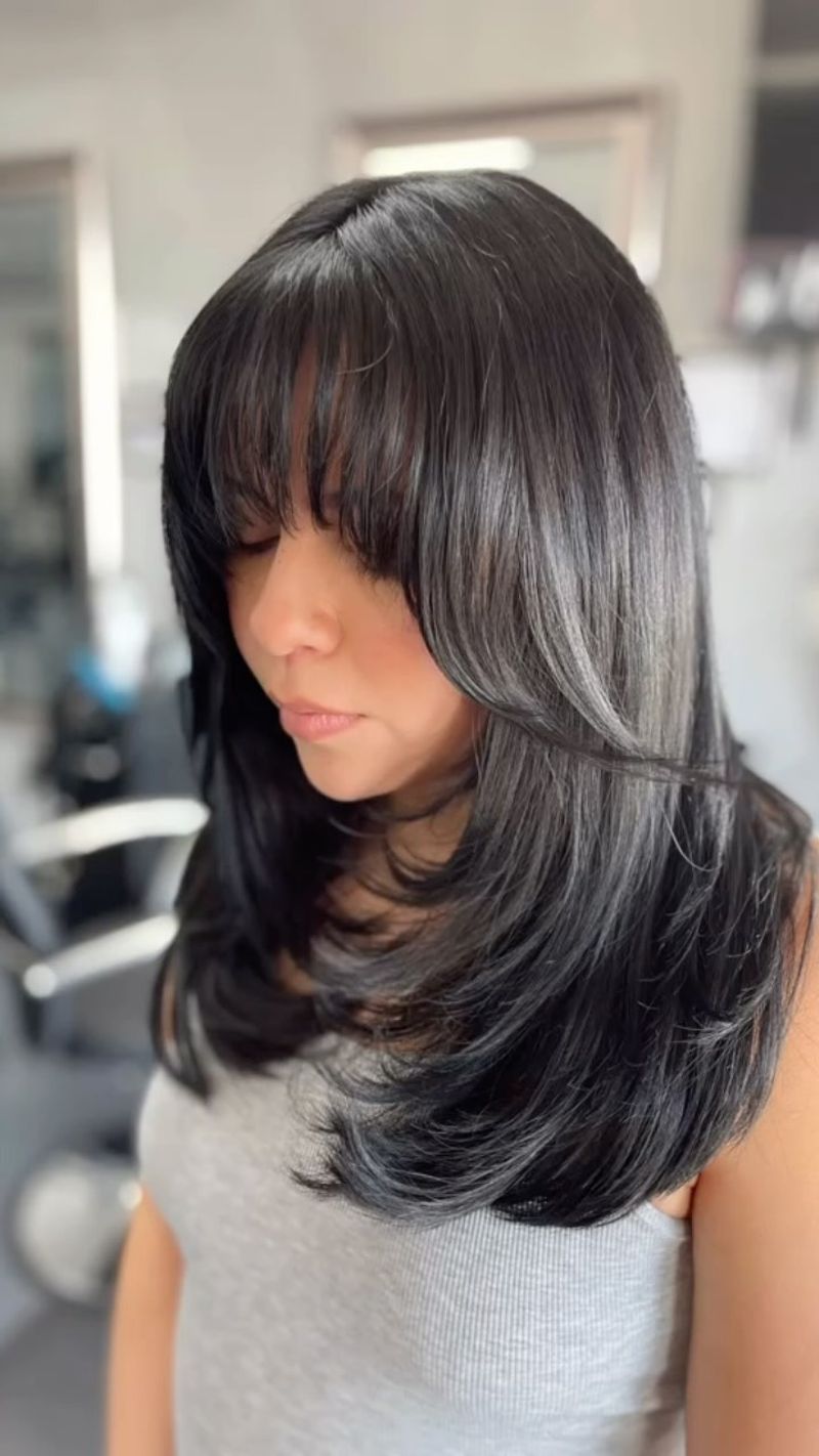 Corte a capas con flequillo ondulado