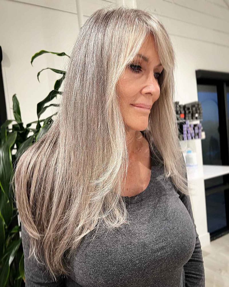 Volumized Layers with Curtain Bangs