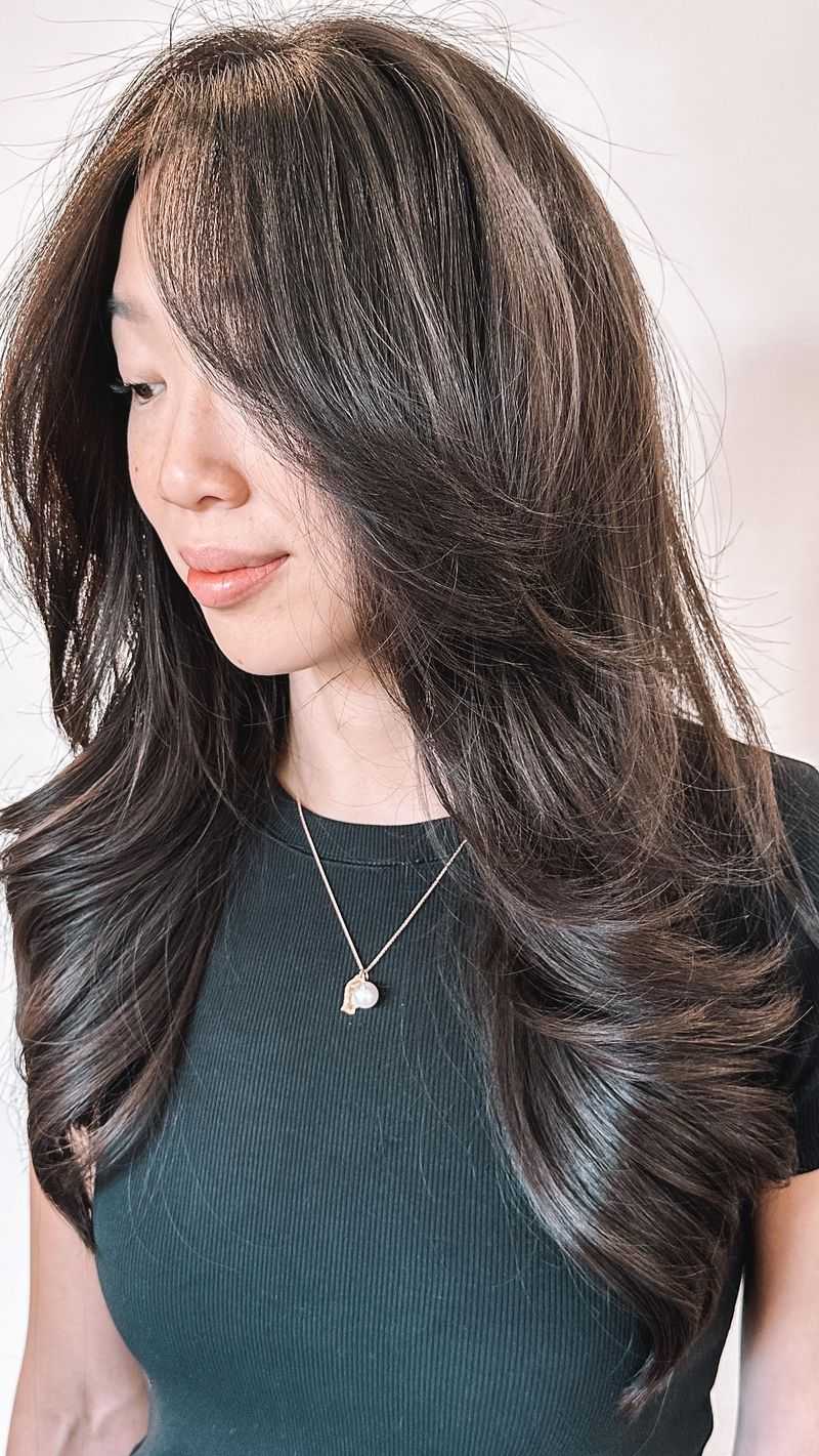 Long Layers With Parted Bangs