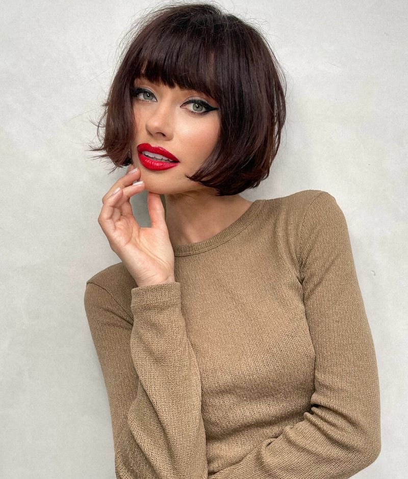 Layered Chin-Length Cut with Full Fringe