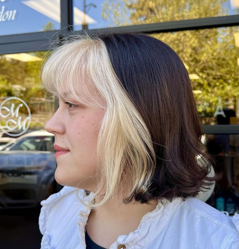 Heavy, Blunt-Cut Bangs With Layers