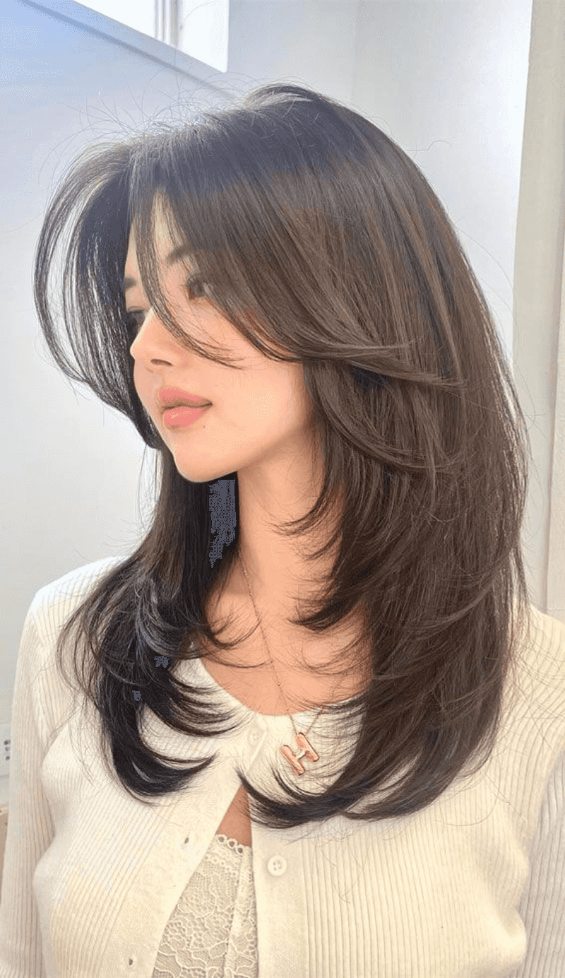 De longues mèches pour des cheveux épais