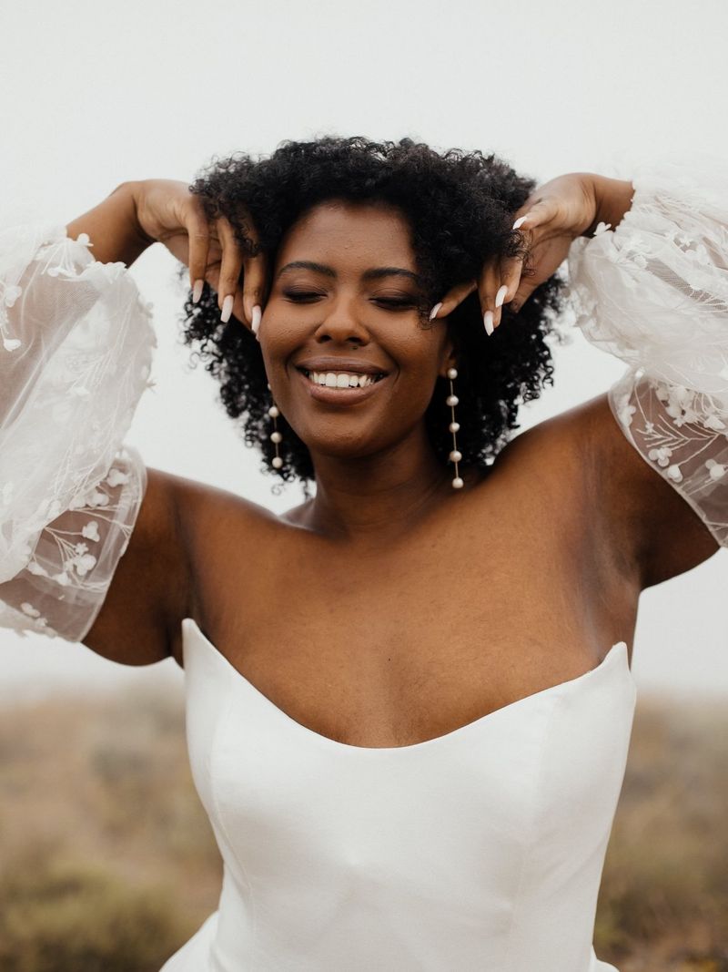 Voluminous Afro with Pearl Accents