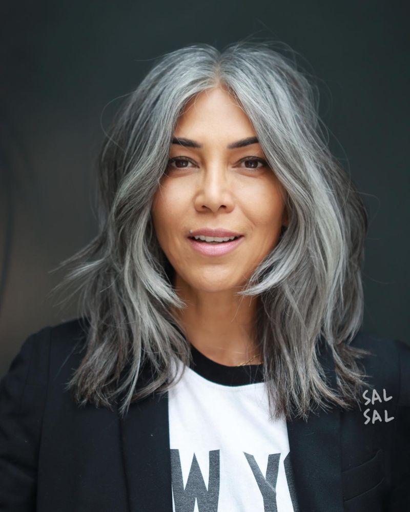 Layered Mid-Length Cut with Face-Framing