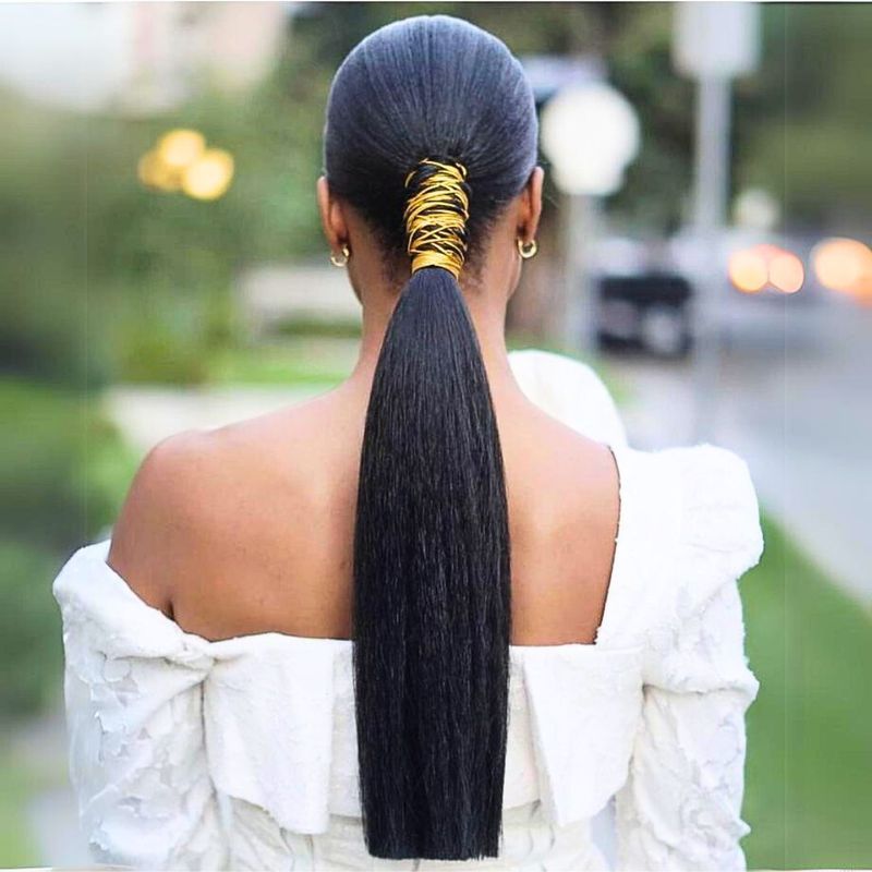 Sleek Low Ponytail with a Twist