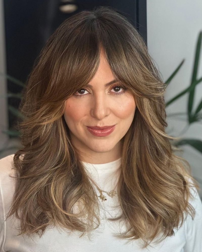 Curtain Bangs With Layered Midlength Cut