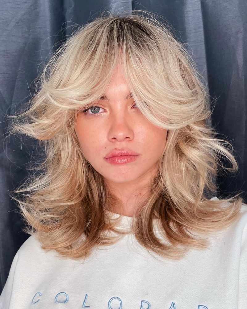 Choppy Midi with Thick Curtain Bangs