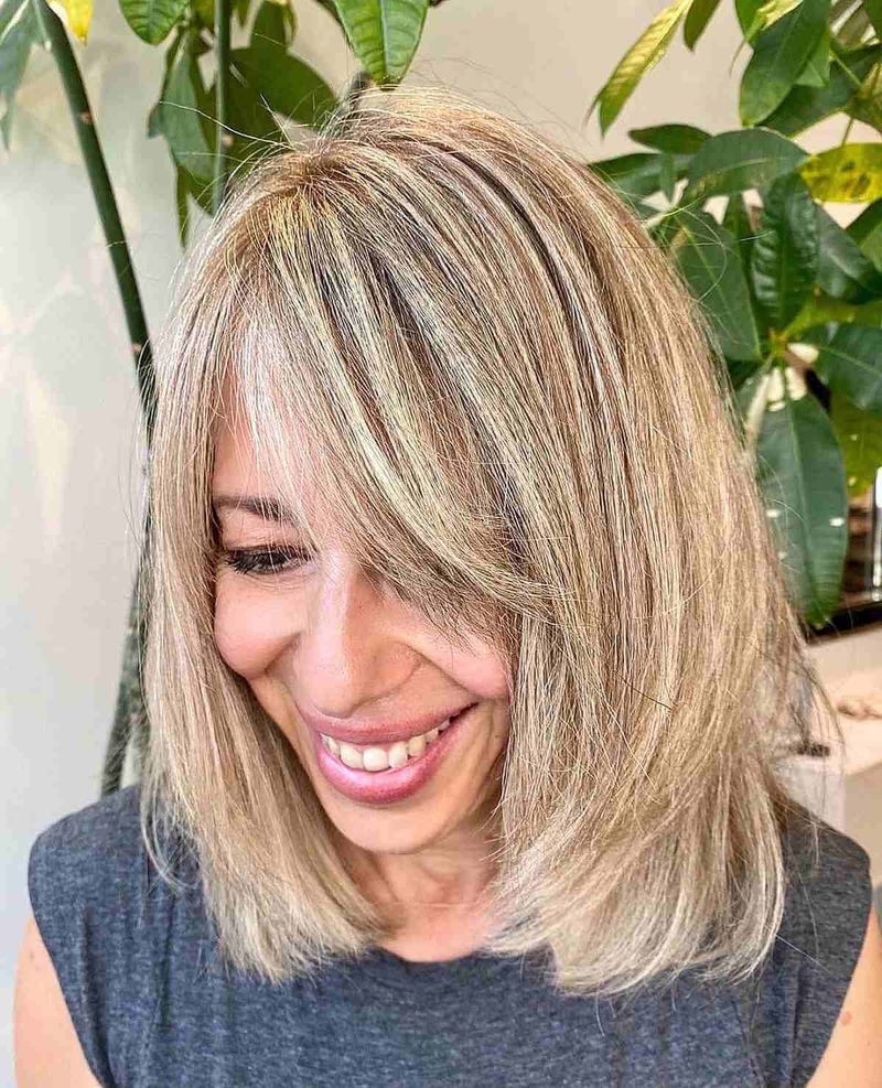 Layered Cut with Side-Swept Fringe