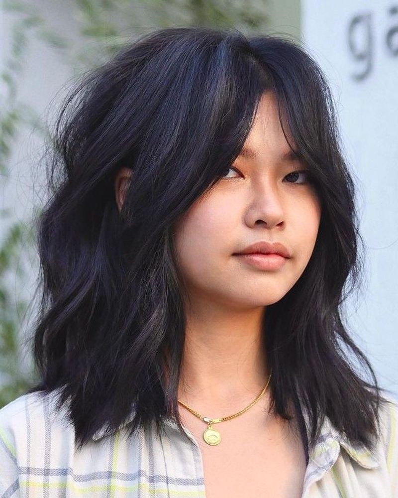 Shoulder-Length Shag with Curtain Bangs