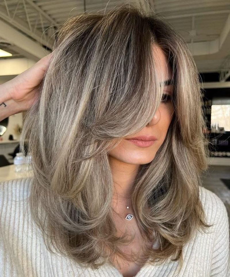 Layered Mid-Length Cut With Face-Framing