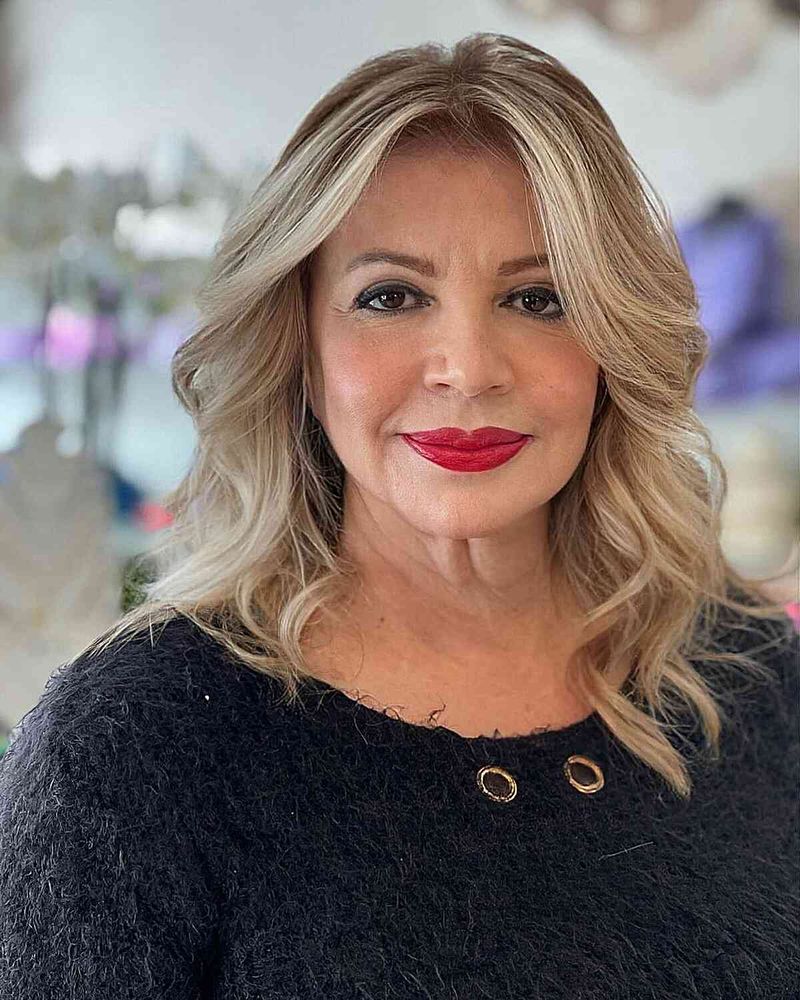 Smooth Shoulder-Length Cut with Center Part