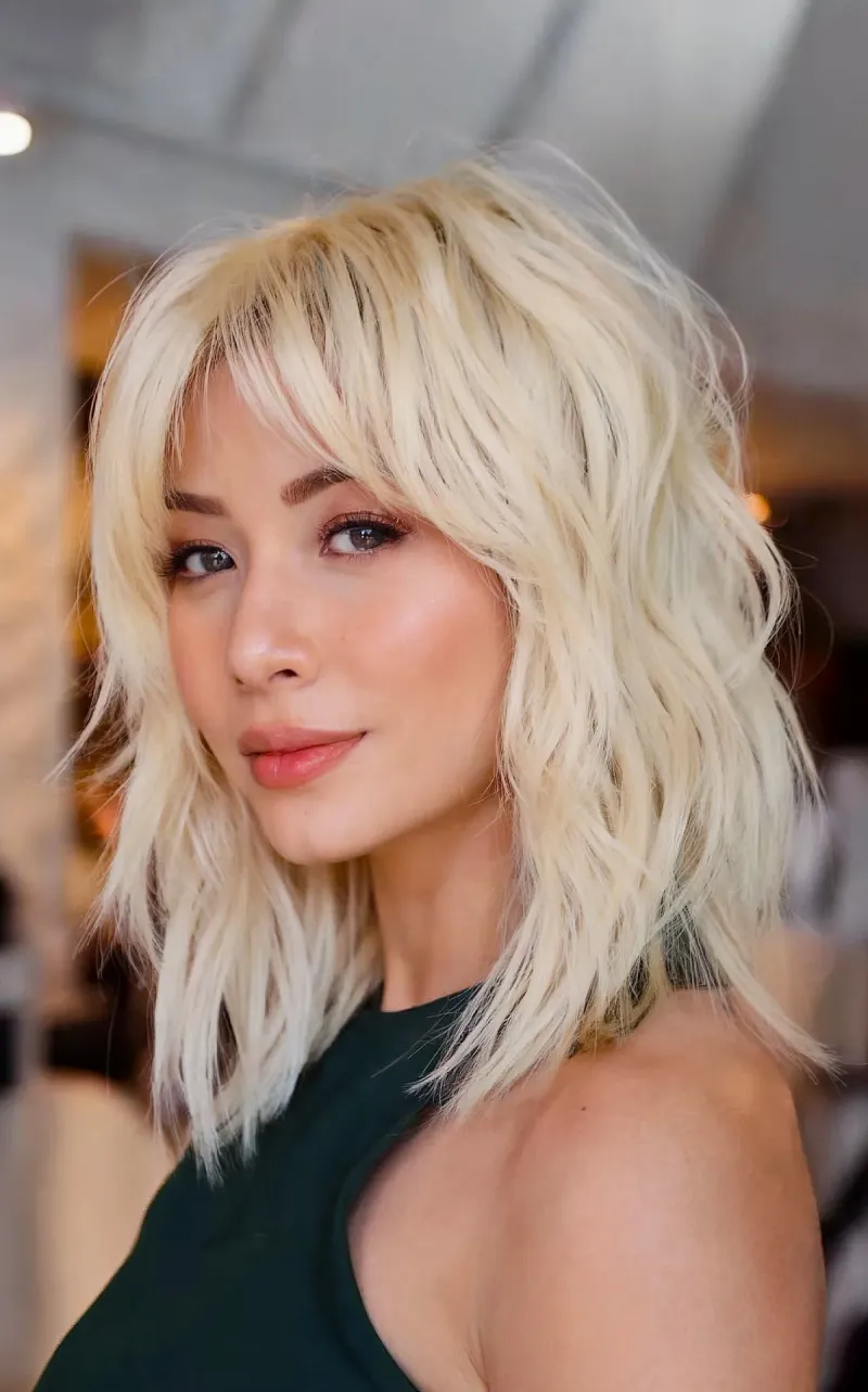 Soft Shaggy Layers with Curtain Bangs
